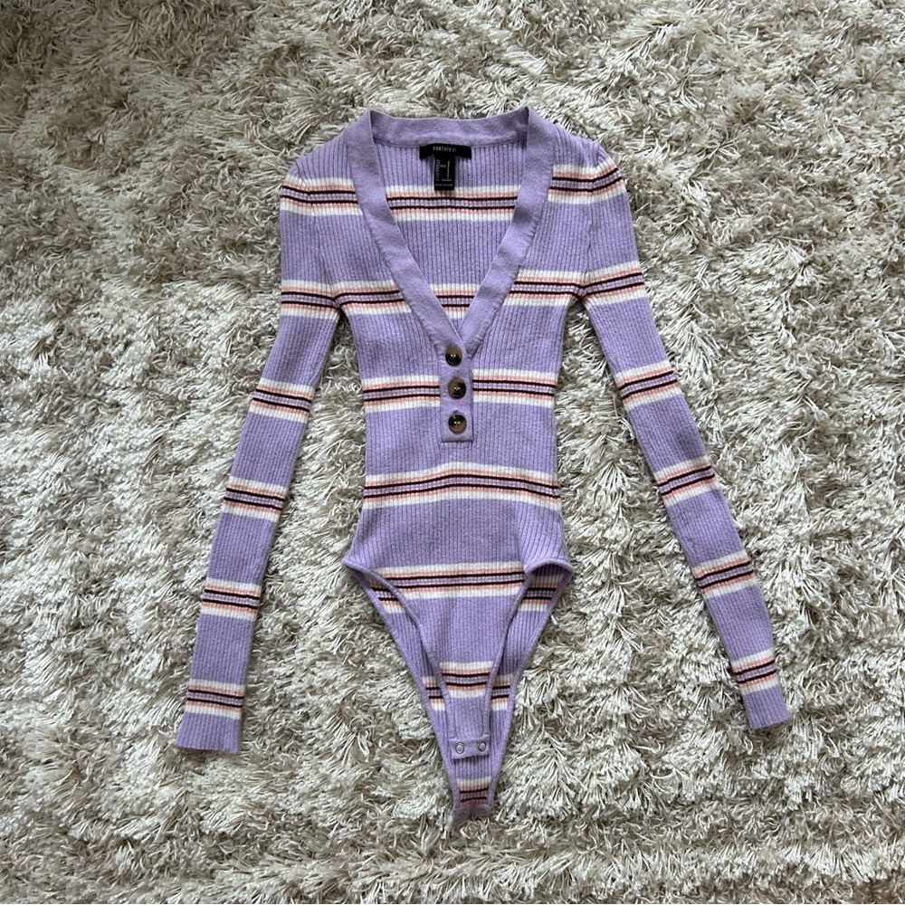 Light purple, striped, fitted, long sleeve body suit with v-neck.